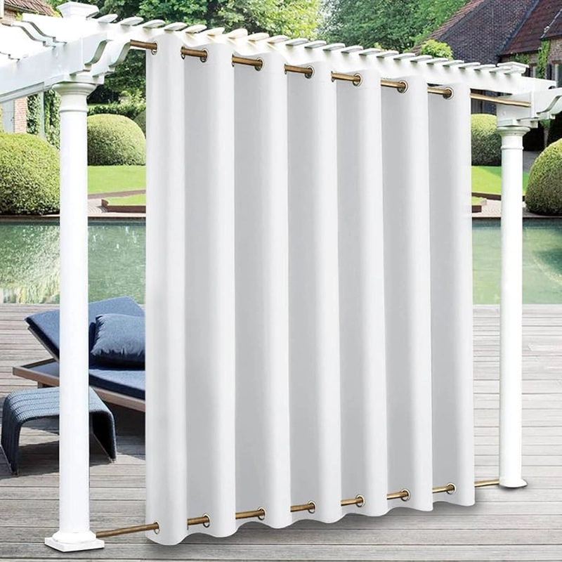 white outdoor curtains hang from a rod attached to a white pergola