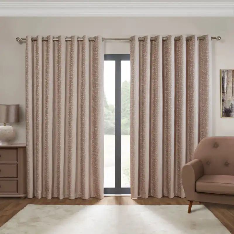 Patterned thermal curtains dubai in a cozy living room